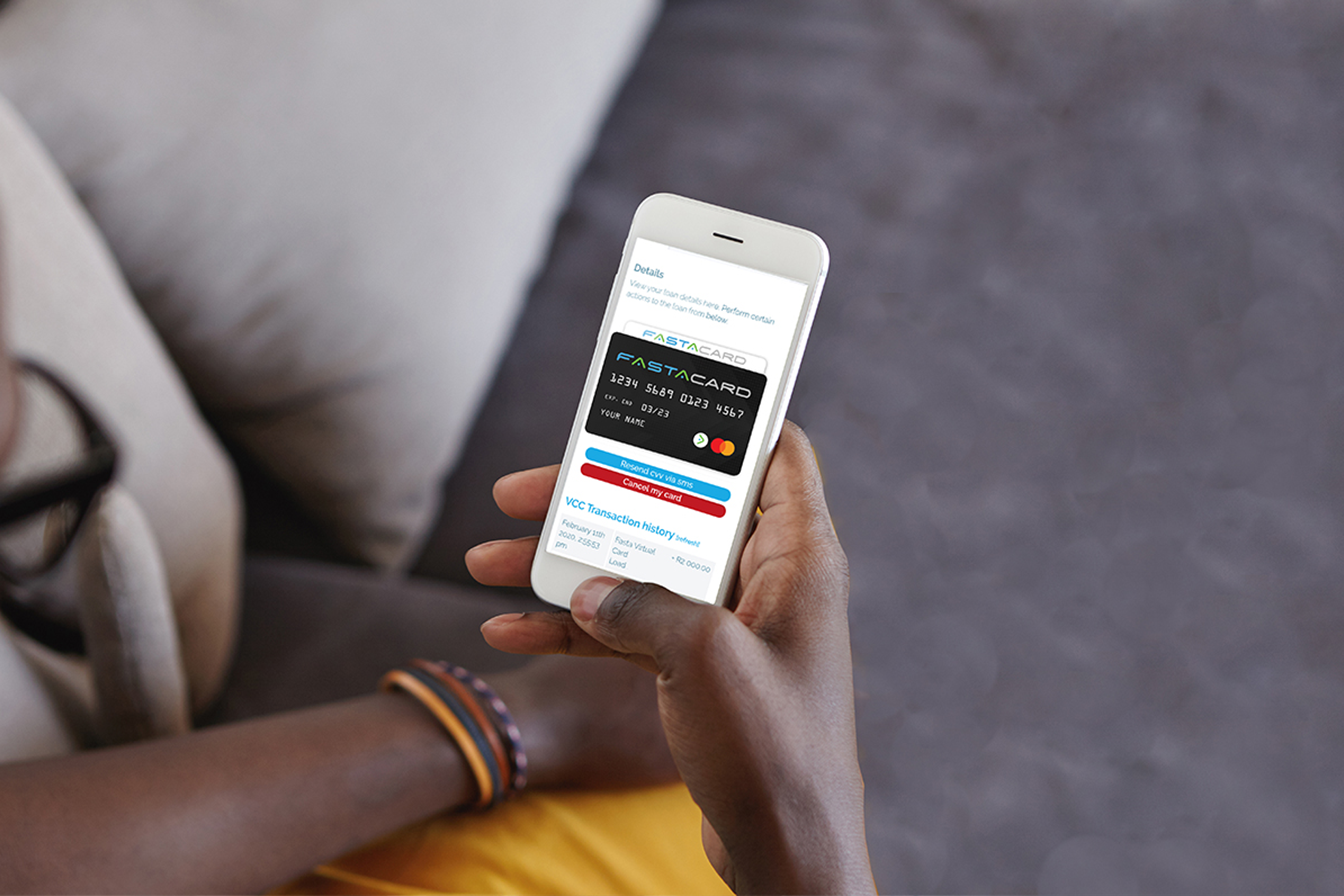 man holding a phone with fastacard on the screen