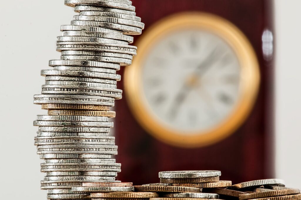 selective focus photo of stacked coins for instant cash loan