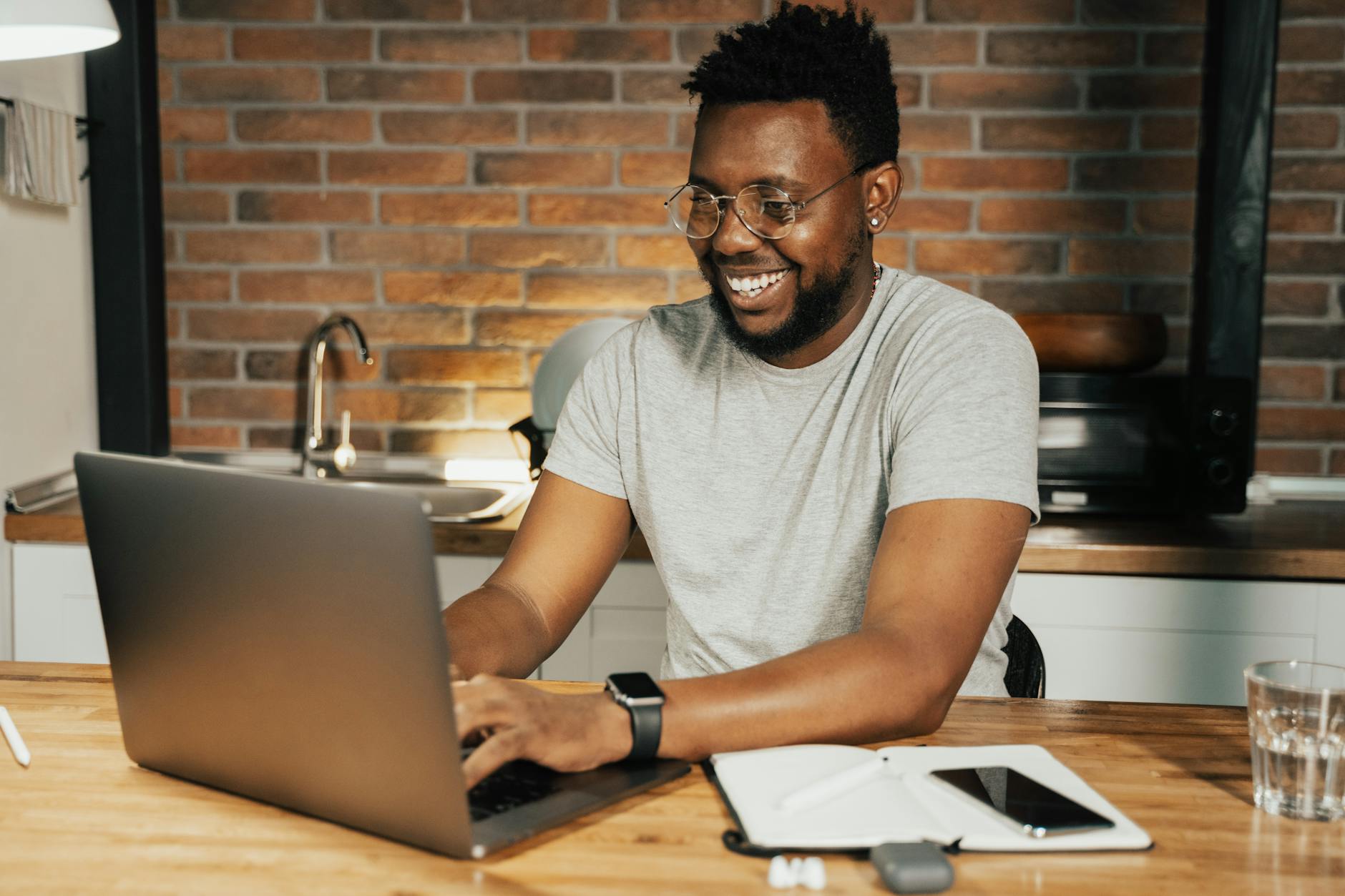 man using a laptop to search for short term loan