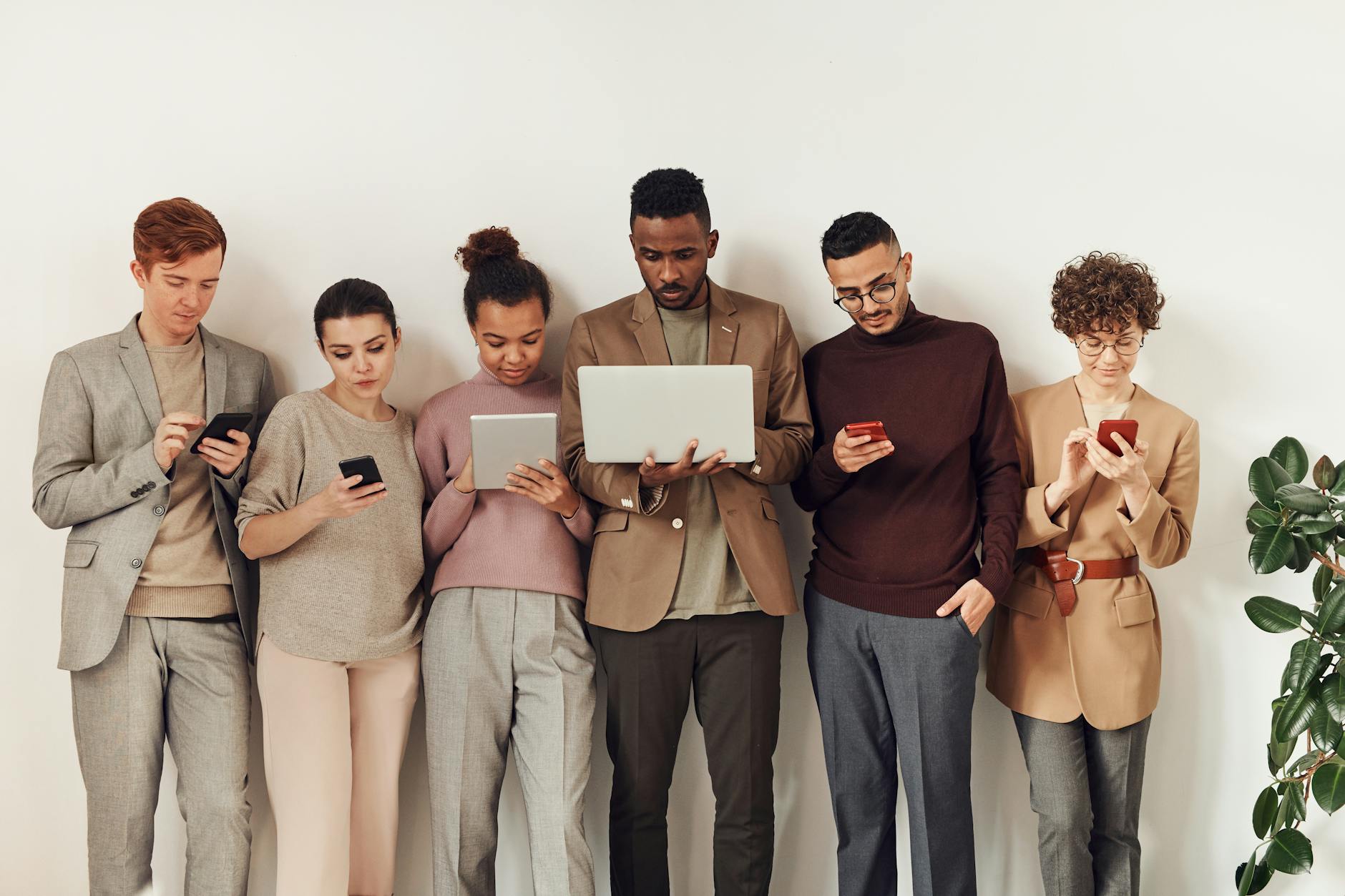 photo of people using gadgets to check their credit score